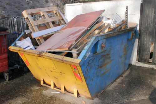 Professional team clearing a cluttered garage