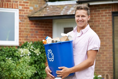 Team sorting items for recycling and disposal during a mid-size clearance